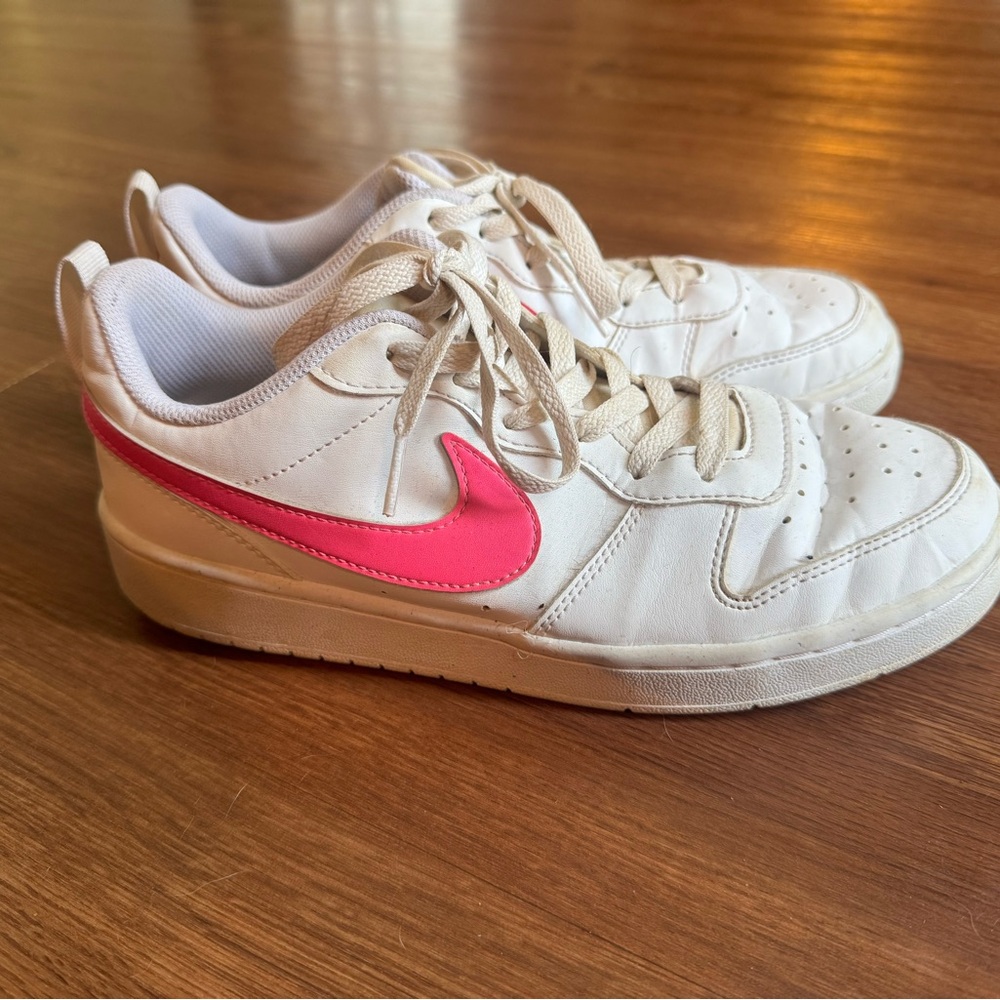 Nike Youth White Sneakers with Pink Swoosh Accent